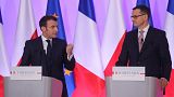 French President Emmanuel Macron (L) and Polish Prime Minister Mateusz Morawiecki address a press conference after signing an agreement on February 3, 2020 in Warsaw.