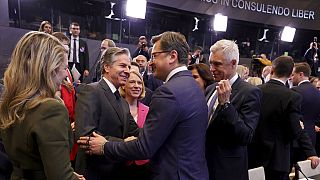 U.S. Secretary of State Antony J. Blinken, center left, speaks with Ukraine's Foreign Minister Dmytro Kuleba, center right, at the NATO HQ in Brussels.