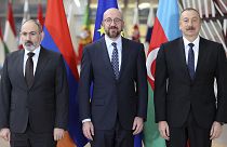 Armenian Prime Minister Nikol Pashinyan(L), European Council President Charles Michel (C), and Azerbaijan's President Ilham Aliyev (R).