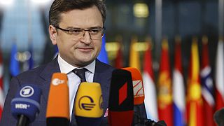 Ukraine's Foreign Minister Dmytro Kuleba speaks with the media as he arrives for a meeting of NATO foreign ministers at NATO headquarters in Brussels,