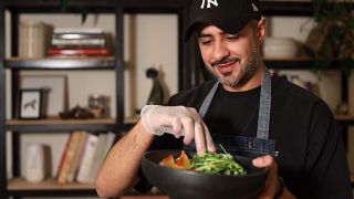 Qatari chef Khaled Alrayes cooking an Iftar meal in Doha, Qatar 