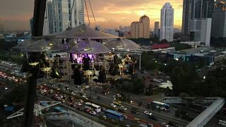 Enjoy a meal whilst hanging 100ft above Jakarta