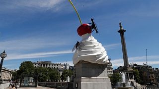 FILE - A new work of art entitled 'The End' by artist Heather Phillipson which was unveiled on the fourth plinth in Trafalgar Square in London, 30 July 2020