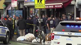 This still image provided by WABC shows law enforcement gathering at the scene of a shooting in the Brooklyn borough of New York on Tuesday, April 12, 2022.