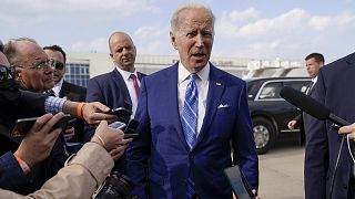 President Joe Biden speaks to reporters before boarding Air Force One at Des Moines International Airport in Iowa on 12 April, 2022