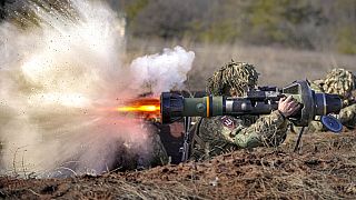 An Ukrainian serviceman fires an NLAW anti-tank weapon during an exercise in the Joint Forces Operation, in the Donetsk region