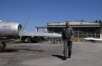 Major Leandro Syka walks inside of Kucova Air Base, which will turn into a NATO air base on March 23, 2022.