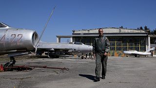 Major Leandro Syka walks inside of Kucova Air Base, which will turn into a NATO air base on March 23, 2022.
