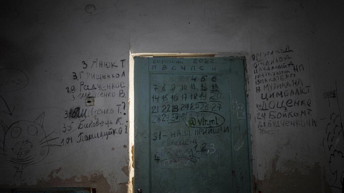 The names of the dead were scrawled on the basement's entrance