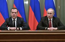 Russian President Vladimir Putin, right, and Russian Prime Minister Dmitry Medvedev attend a cabinet meeting in Moscow, Russia, Wednesday, Jan. 15, 2020.