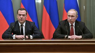 Russian President Vladimir Putin, right, and Russian Prime Minister Dmitry Medvedev attend a cabinet meeting in Moscow, Russia, Wednesday, Jan. 15, 2020.