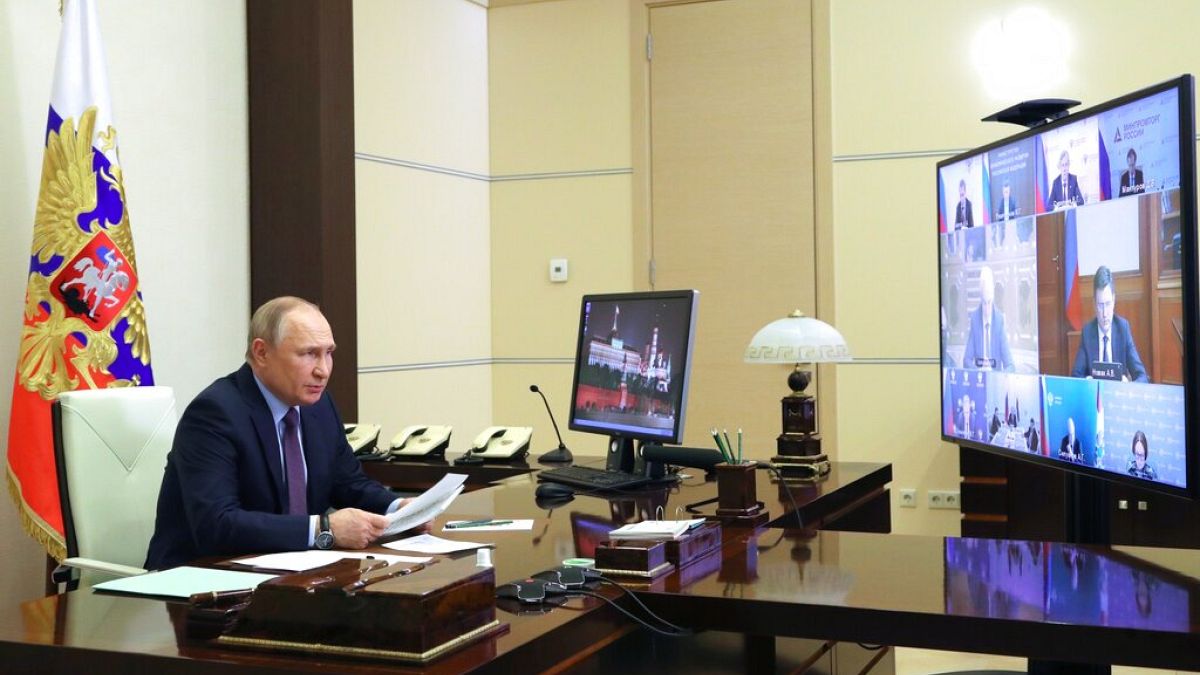 Russian President Vladimir Putin chairs a meeting on the situation in the oil and gas sector via videoconference
