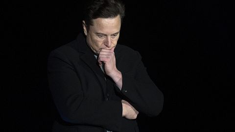 Elon Musk gestures as he speaks during a press conference at SpaceX's Starbase facility near Boca Chica Village in South Texas, 2022
