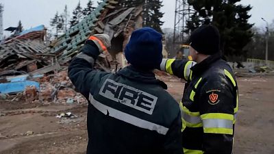 Rescuers clear rubble from damaged houses in Chernihiv