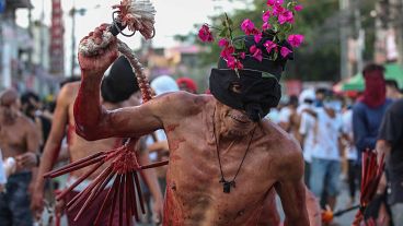  To mark the holy week of Easter in the Philippines, devout Catholics take to the streets to re-enact the crucifixion of Jesus Christ