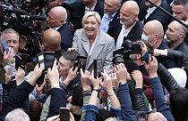 French far-right leader and presidential candidate Marine Le Pen campaigns, Monday, April 18, 2022 in Saint-Pierre-en-Auge, Normandy.
