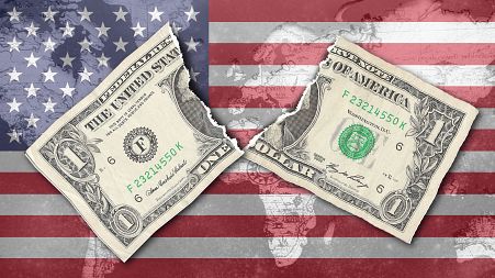 Composite image shows a dollar bill against the backdrop of a US flag and overlaid map of the world.