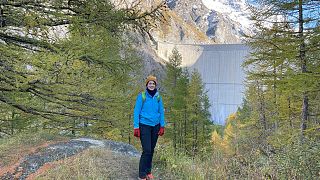 Euronews Travel journalist Hannah Brown at Mauvoisin Dam