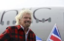 Virgin founder Sir Richard Branson arrives on a Boeing 787-9 for an event announcing Virgin Atlantic's new non-stop daily Seattle to London flights