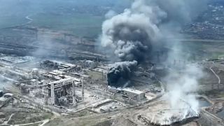 Footage released by Mariupol City Council on April 19, 2022 shows clouds of smoke billowing above Azovstal steel plant