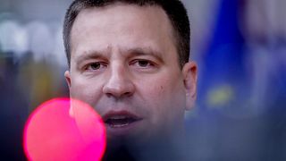 Former Estonian prime minister Juri Ratas speaks on camera as he arrives for an EU summit at the European Council building in Brussels, Friday, Oct. 2, 2020