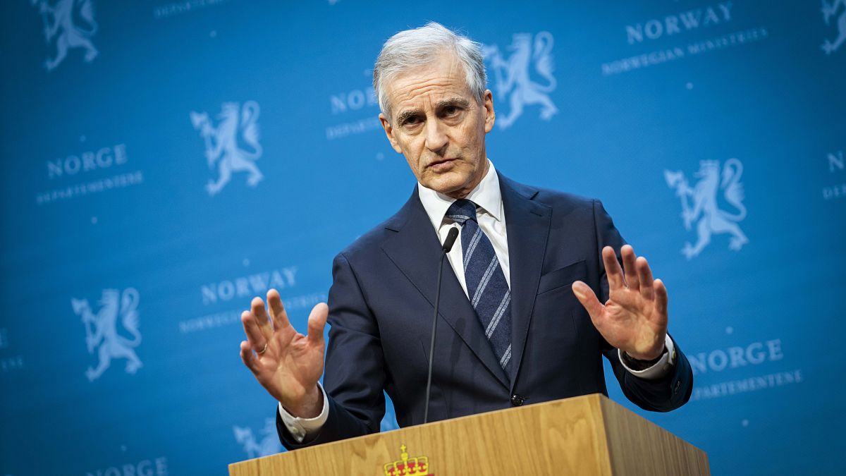 Norway's Prime Minister Jonas Gahr Store gestures during a press conference in Oslo.
