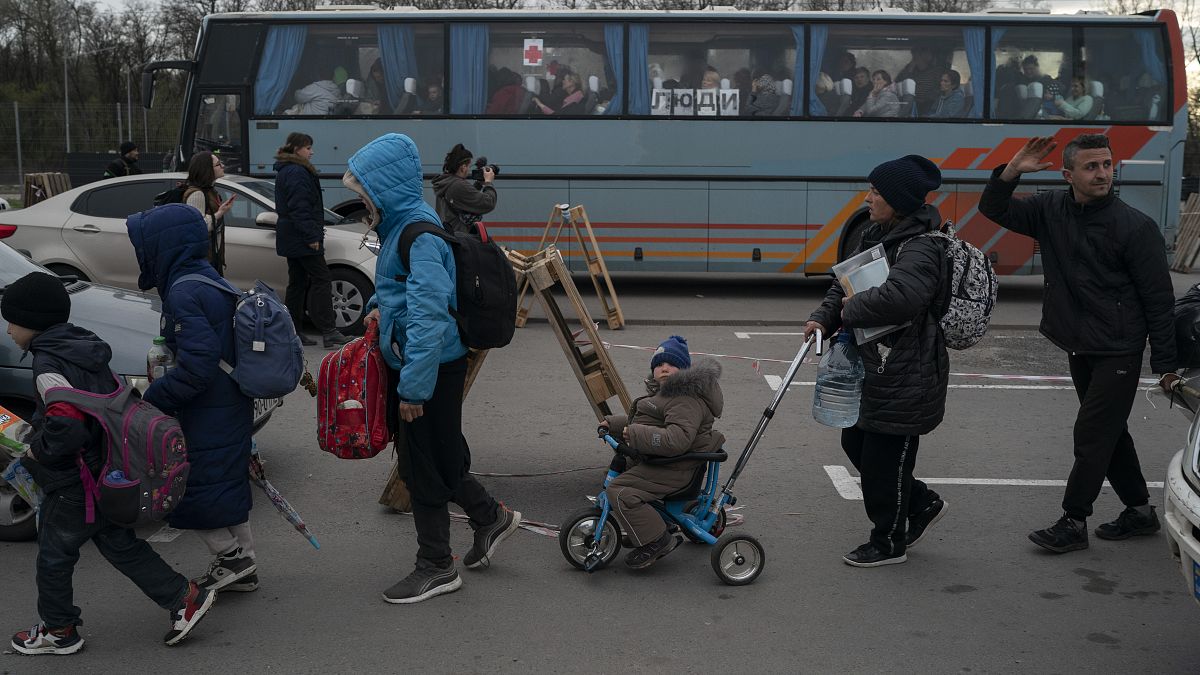 Evacuees from Mariupol at a refugee centre in Zaporizhzhia, Ukraine, Thursday, April 21, 2022. Russia is accused of forcibly deporting many Ukrainians to Russian territory.