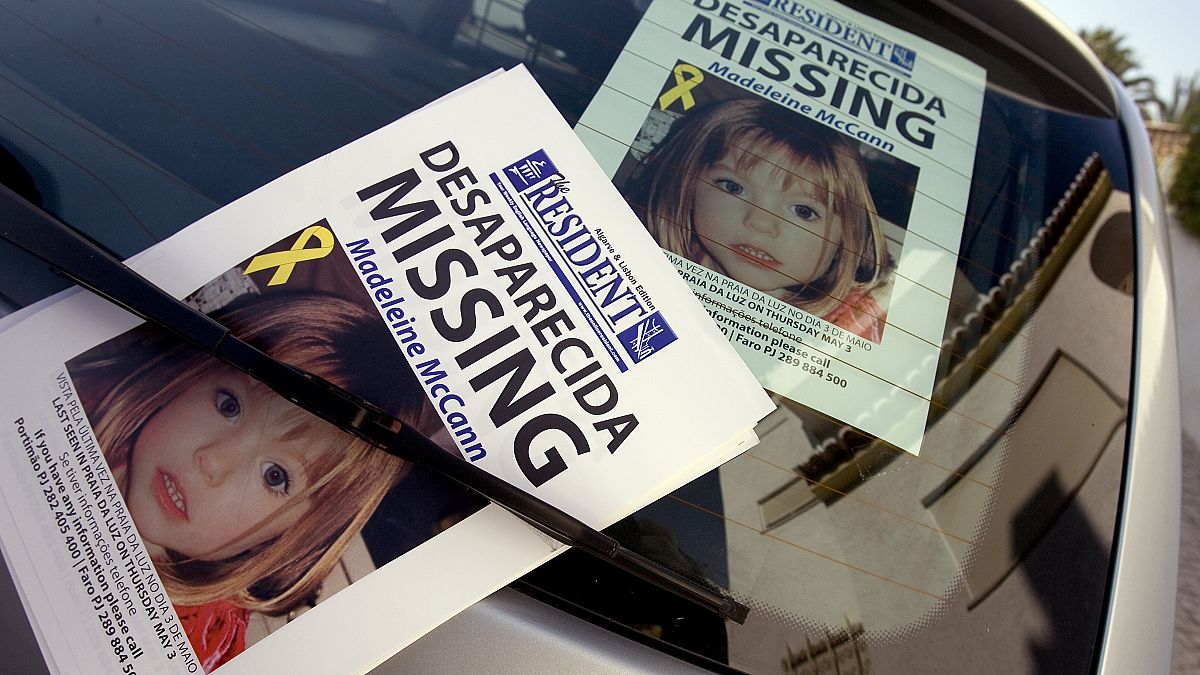 The apartment where British girl Madeleine McCann disappeared one year ago is seen with her picture on a windscreen Saturday May 3, 2008 at Praia da Luz beach, Lagos, Portugal