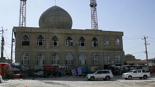 This frame grab image from video, shows upper floor window blown out after a bomb explosion inside a mosque, in Mazar-e-Sharif province, Afghanistan, Thursday, April 21, 2022