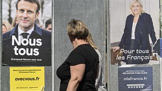 Campaign posters for French presidential candidates Emmanuel Macron and Marine Le Pen in Eguisheim, eastern France, on April 21, 2022