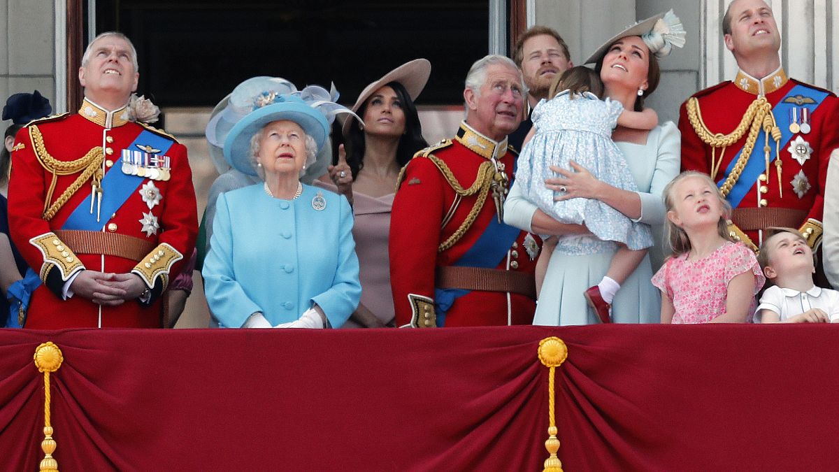 (L-R) Prince Andrew, Queen Elizabeth, Meghan Duchess of Sussex, Prince Charles, Prince Harry, Duchess and Duke of Cambridge at the Trooping the Colour ceremony, June 9, 2018.