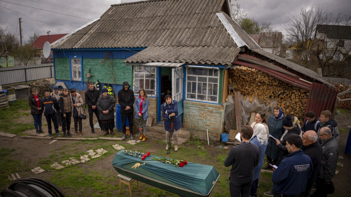 Funereal at home at the Ozera village, near Bucha, Ukraine,