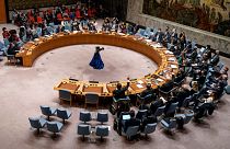 AP PFILE - Representatives voting in favor of a resolution raise their hands during a UN Security Council meeting on the Russian invasion of the Ukraine, 25 February, 2022