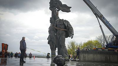 A Soviet era monument to friendship between Ukraine and Russia in Kyiv during its demolition on Tuesday April 26, 2022. 
