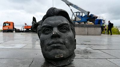 Soviet 'friendship monument' taken down in Kyiv