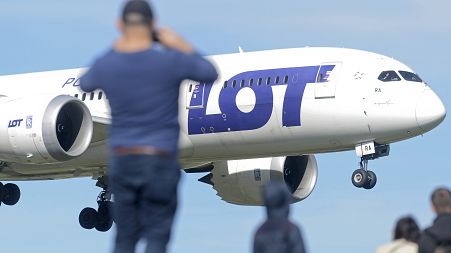 A Polish Airlines LOT jetliner lands at the Frederic Chopin airport in Warsaw.