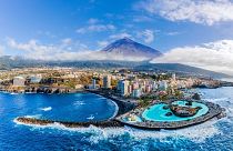 An aeriel view of Puerto de la Cruz, one of Tenerife's top resorts. Flights to the island from London were down by 65 per cent last week, compared to the same time last year.