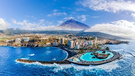 An aeriel view of Puerto de la Cruz, one of Tenerife's top resorts. Flights to the island from London were down by 65 per cent last week, compared to the same time last year.