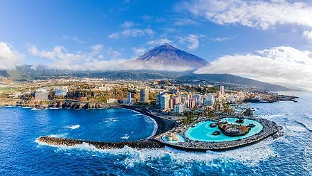 An aeriel view of Puerto de la Cruz, one of Tenerife's top resorts. Flights to the island from London were down by 65 per cent last week, compared to the same time last year.