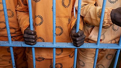 Two former executives charged and jailed for corruption in Guinea