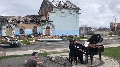 The ruins of Irpin’s House of Culture were the poignant backdrop to a performance of Chopin’s nocturnes by the Lithuanian pianist Darius Mazintas on April 26.