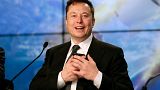 FILE - Elon Musk founder, CEO, and chief engineer/designer of SpaceX speaks during a news conference 