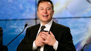 FILE - Elon Musk founder, CEO, and chief engineer/designer of SpaceX speaks during a news conference