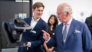 Prince Charles views a design at the Royal College of Art for the school's Terra Carta Design Lab Exhibition.