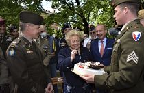 The cake was presented to 90-year-old Meri Mion by soldiers from US Army Garrison Italy.
