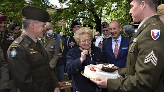 The cake was presented to 90-year-old Meri Mion by soldiers from US Army Garrison Italy.