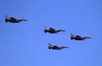 Greek fighter jets fly over the military parade on Independence Day in Athens.