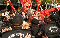 Demonstrators clash with Turkish police during a May Day protest in Istanbul