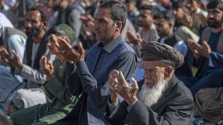 Muslim devotees offer Eid al-Fitr prayers, which marks the end of the holy fasting month of Ramadan outside a mosque in Kabul.