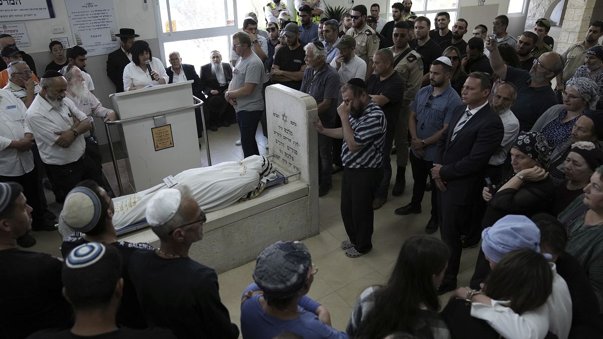 Похороны убитого террористами охранника еврейского поселения
